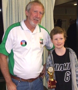 Club legend Doug McLaggan with Dillon Barrett, who won the Doug McLaggan Trophy as the Under 10 White team's best all-rounder.